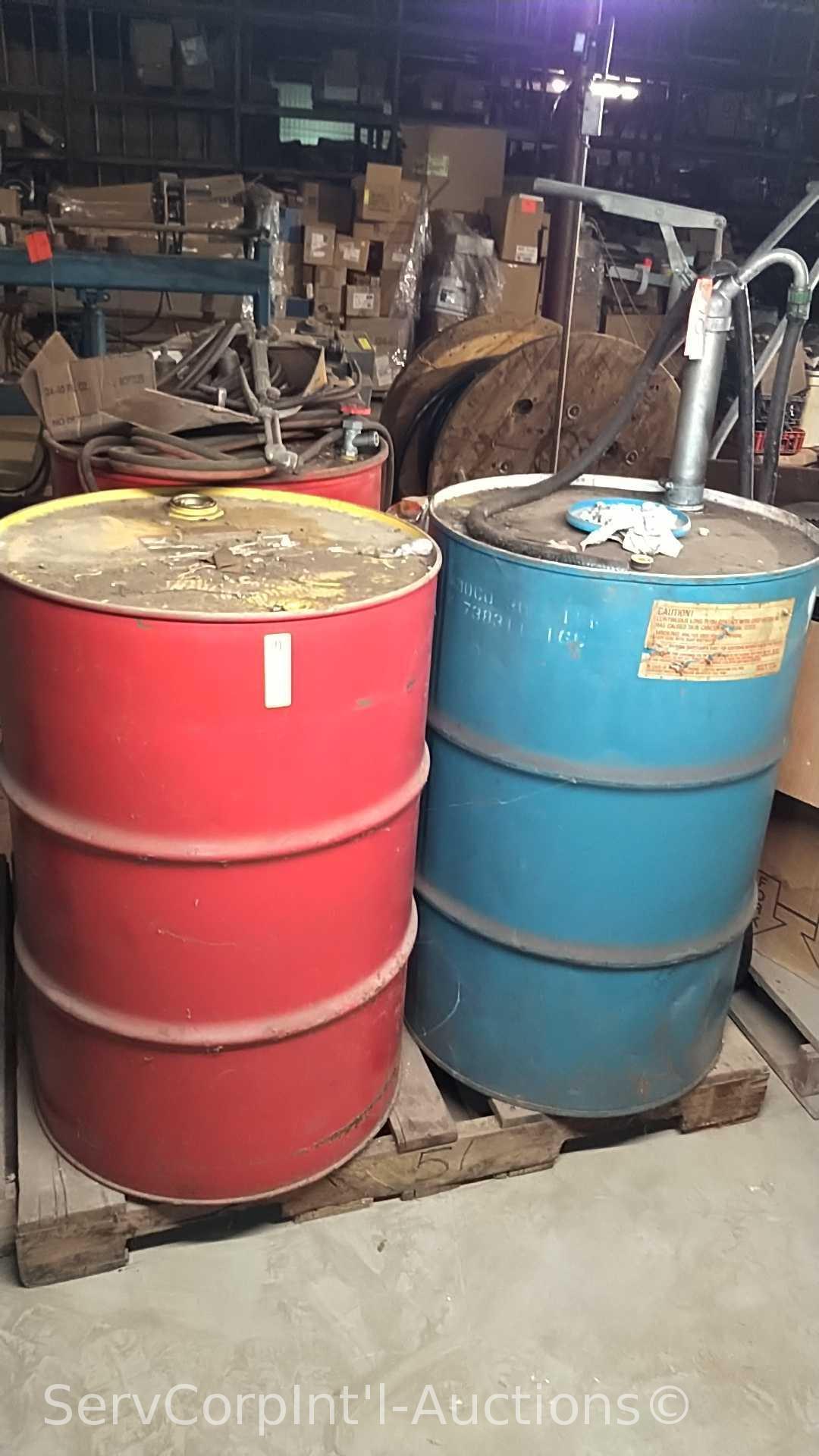 Lot on Pallet of Various Oil Drums, Oil Pump, Torch Hoses with Gauges