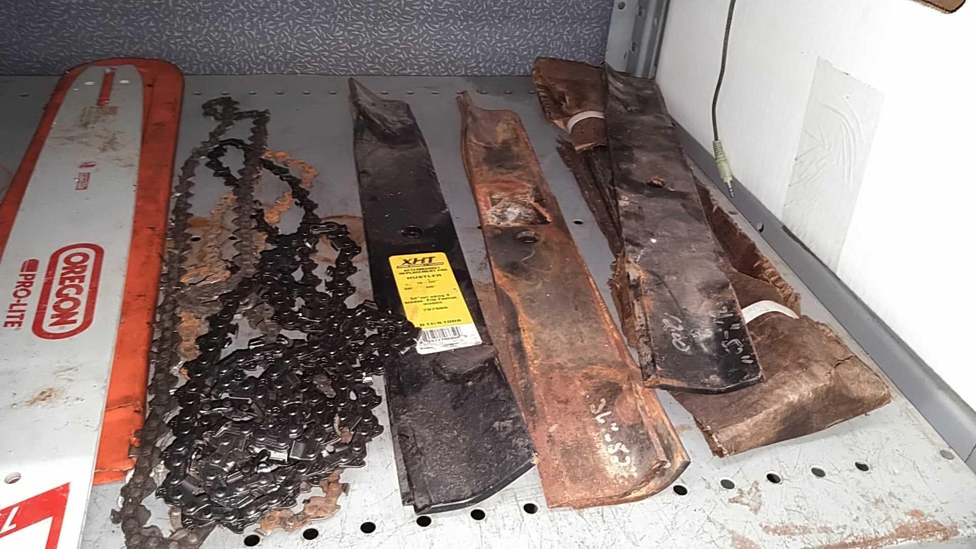Lot on Shelf of Husqvarna Chainsaw, Various Chainsaw Bars, Chainsaw Chains, Lawnmower Blades