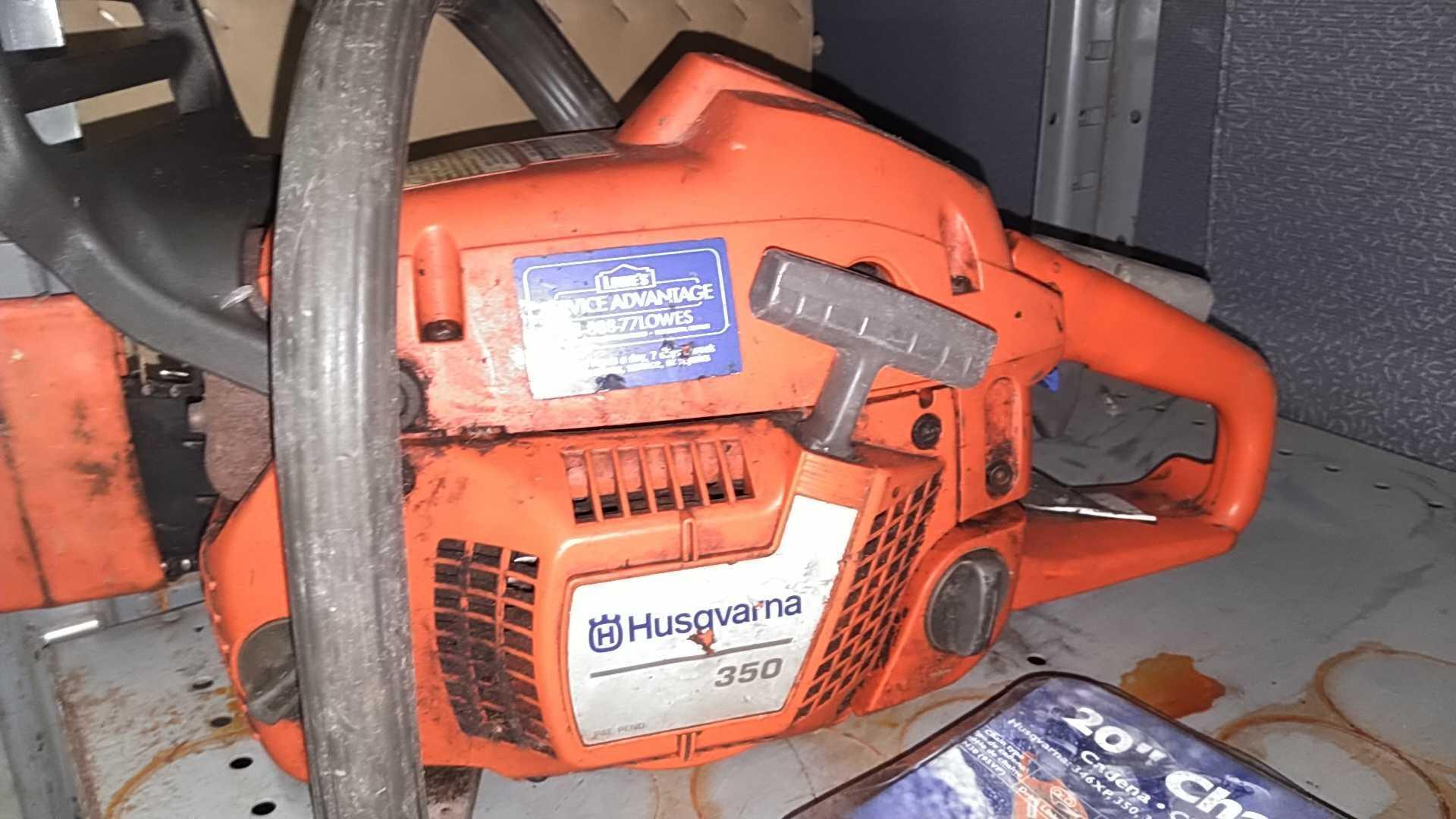 Lot on Shelf of Husqvarna Chainsaw, Various Chainsaw Bars, Chainsaw Chains, Lawnmower Blades