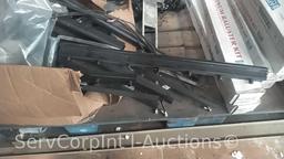 Lot Under Pallet Rack of Various Fluorescent Bulbs, Lighting Shades, Blacktex Rails, Ceiling Mount