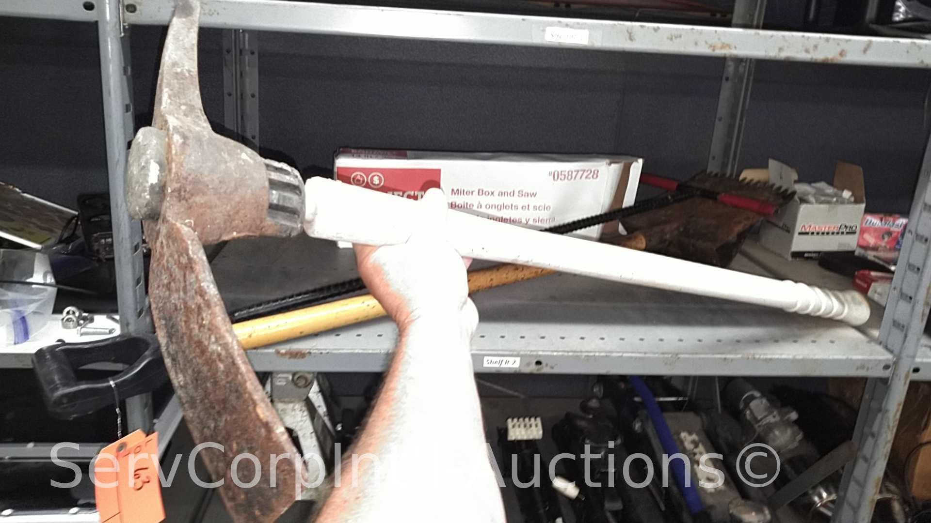Lot on Shelf of Various Machetes, Paint Mixers, Loppers, Pick Axe, Shingle Shovel, Miter Box, Edge