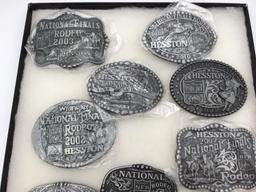 Collection of 11 Hesston Belt Buckles