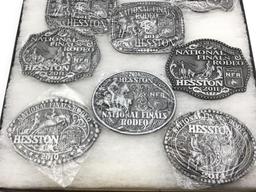 Collection of 11 Hesston Belt Buckles