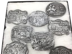 Collection of 11 Hesston Belt Buckles