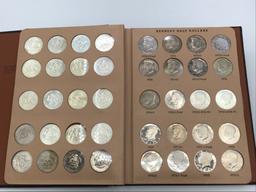 Folder w/ Kennedy Half Dollars Including