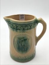 Yelloware & Green Pottery Pitcher w/ Cow Design