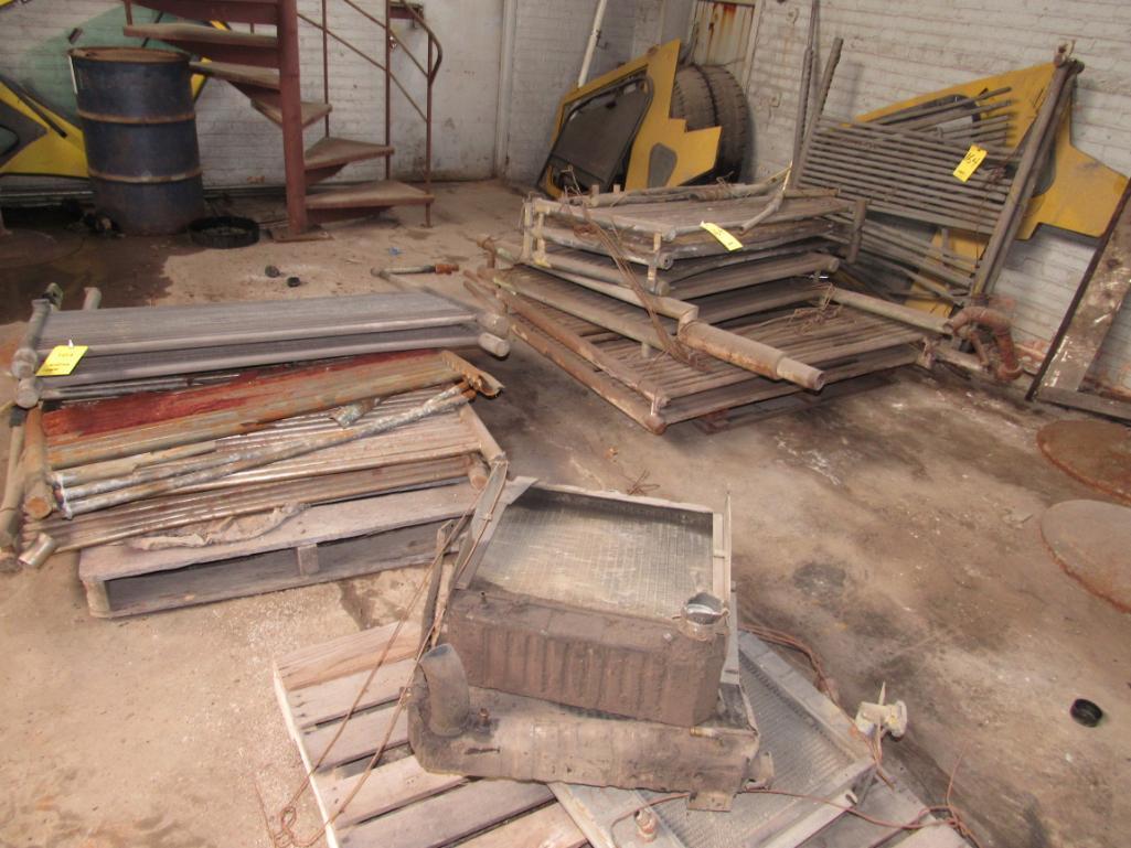 LOT: Assorted Used Zirconium Heat Coils on (2) Skids and by West Wall, also (3) Used Radiators on