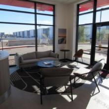 LOT: Contents of Reception Area: Lounge Chairs, Couch, (2) Tables, Area Rug, Lamp, (2) Monitors,