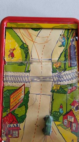 Crank Action Tin Driving Game - Scroll Ripped & Horn Missing