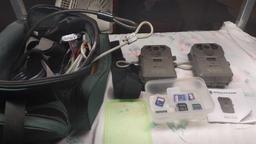 Pair of Stealth Cameras with bag, discs & cables
