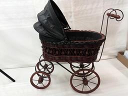 VINTAGE WICKER DOLL CARRIAGE 24" TALL 25"LONG WITH HANDLE PICK UP ONLY.