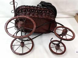 VINTAGE WICKER DOLL CARRIAGE 24" TALL 25"LONG WITH HANDLE PICK UP ONLY.