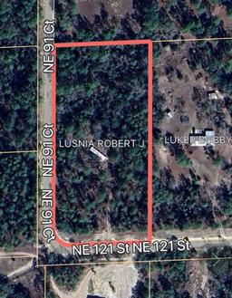 4.37 acre lot with Old Mobile Home - Archer, FL