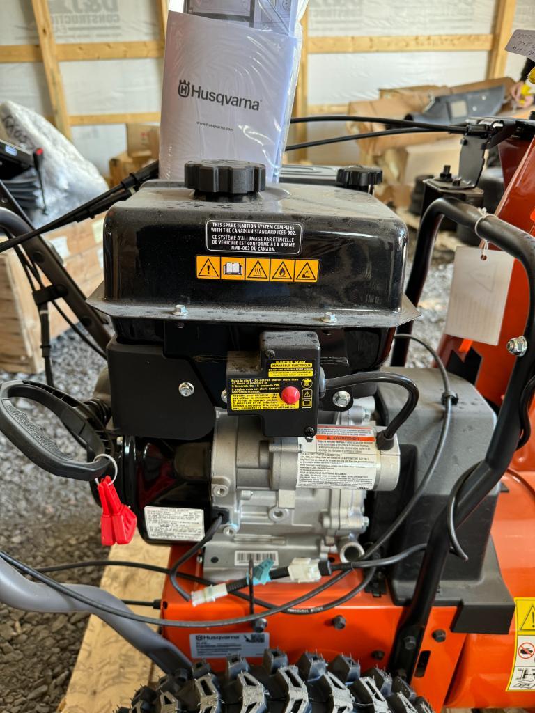 2 New HusqvarnaÊST230 Walk Behind Snowblower