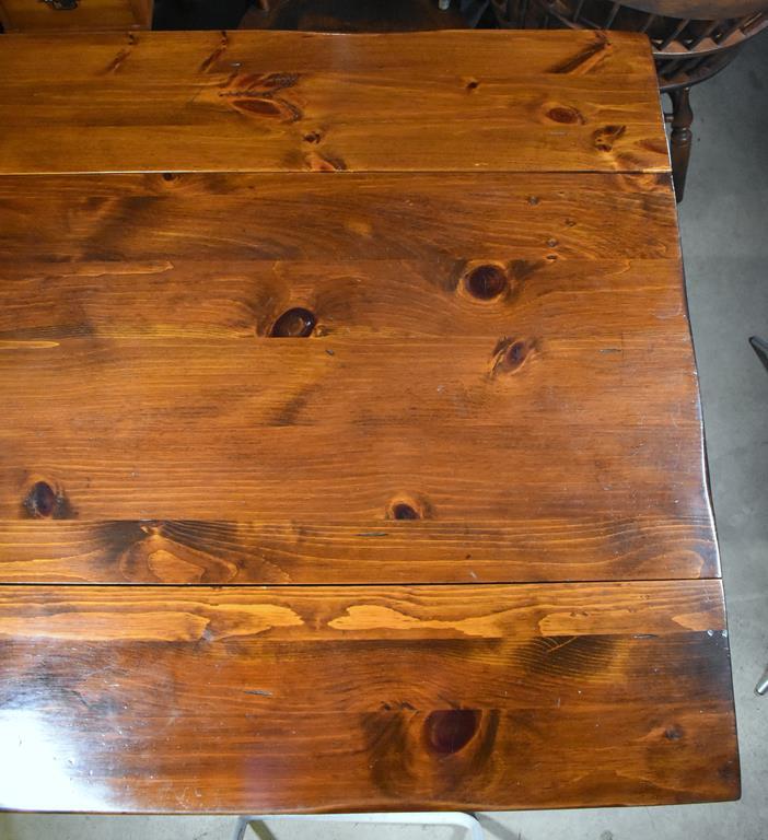 Vintage Dark Stained Knotty Pine Drop Leaf Trestle Dining Table