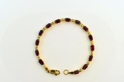 14K Gold and 10.5 Carat Lab Ruby 7.5” Link Bracelet