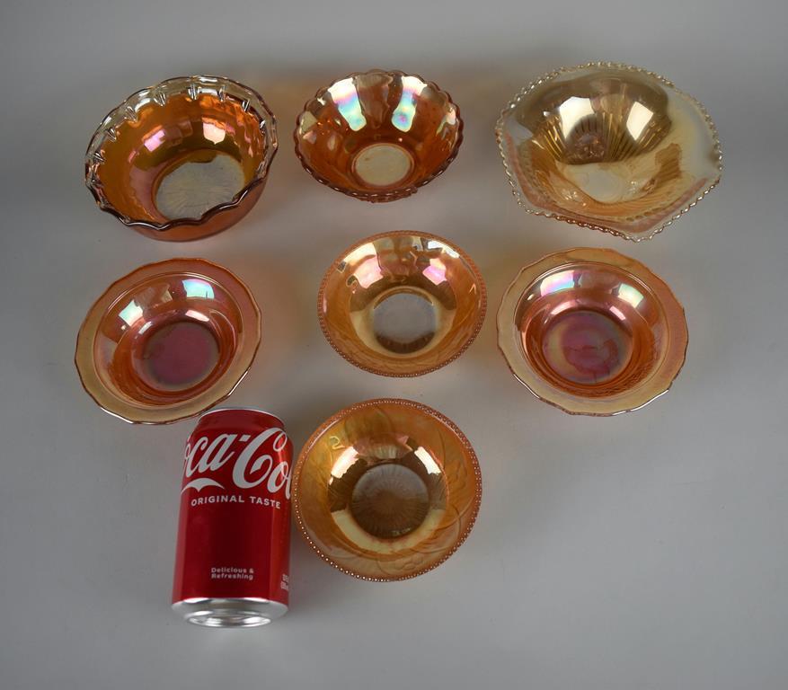 Lot of Seven Small Marigold Carnival Glass Bowls of Various Patterns & Makers