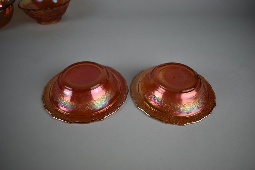 Lot of Seven Small Marigold Carnival Glass Bowls of Various Patterns & Makers