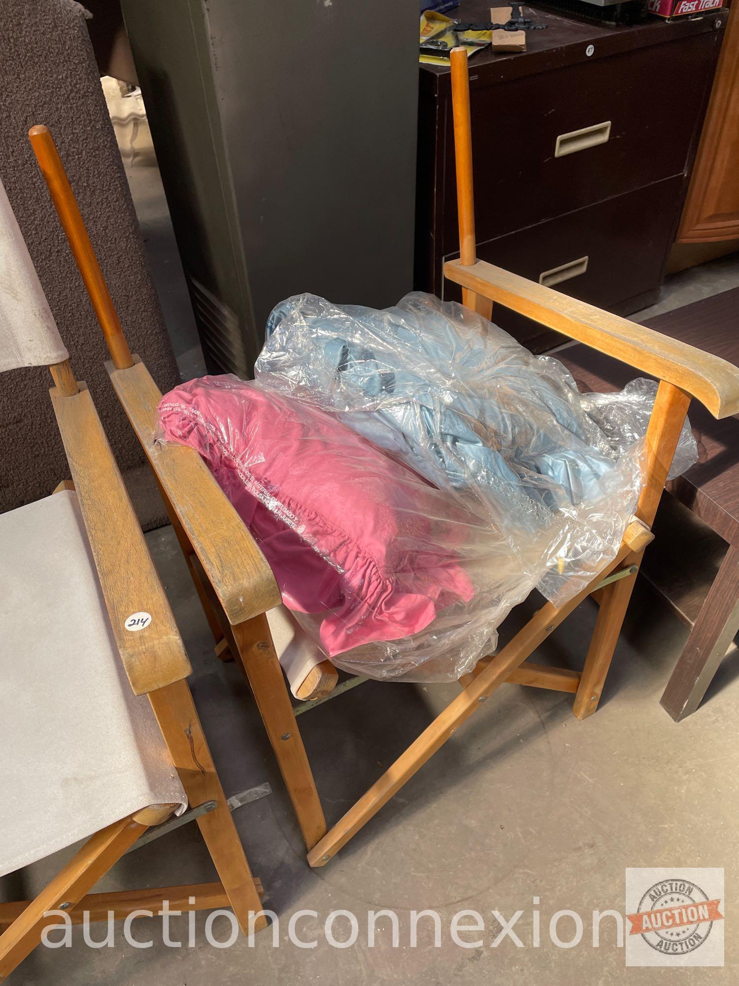 2 director style folding chairs ( 1 missing back material) and 2 throw pillows