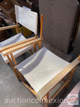 2 director style folding chairs ( 1 missing back material) and 2 throw pillows