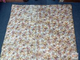 Quilt, floral motif, machine sewn with hand stitched border
