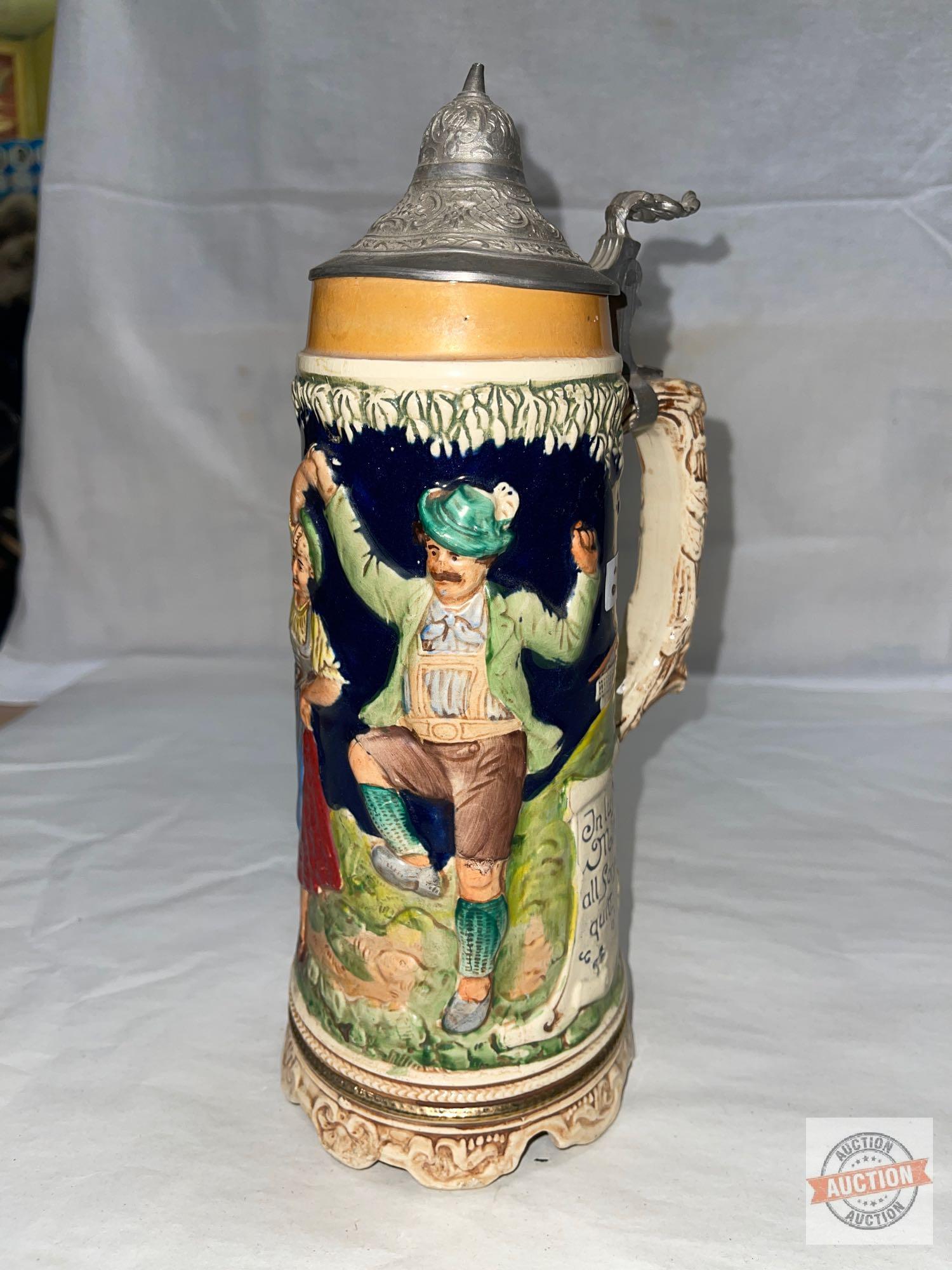 German musical stein with lid, 11"h, embossed motif, does not work