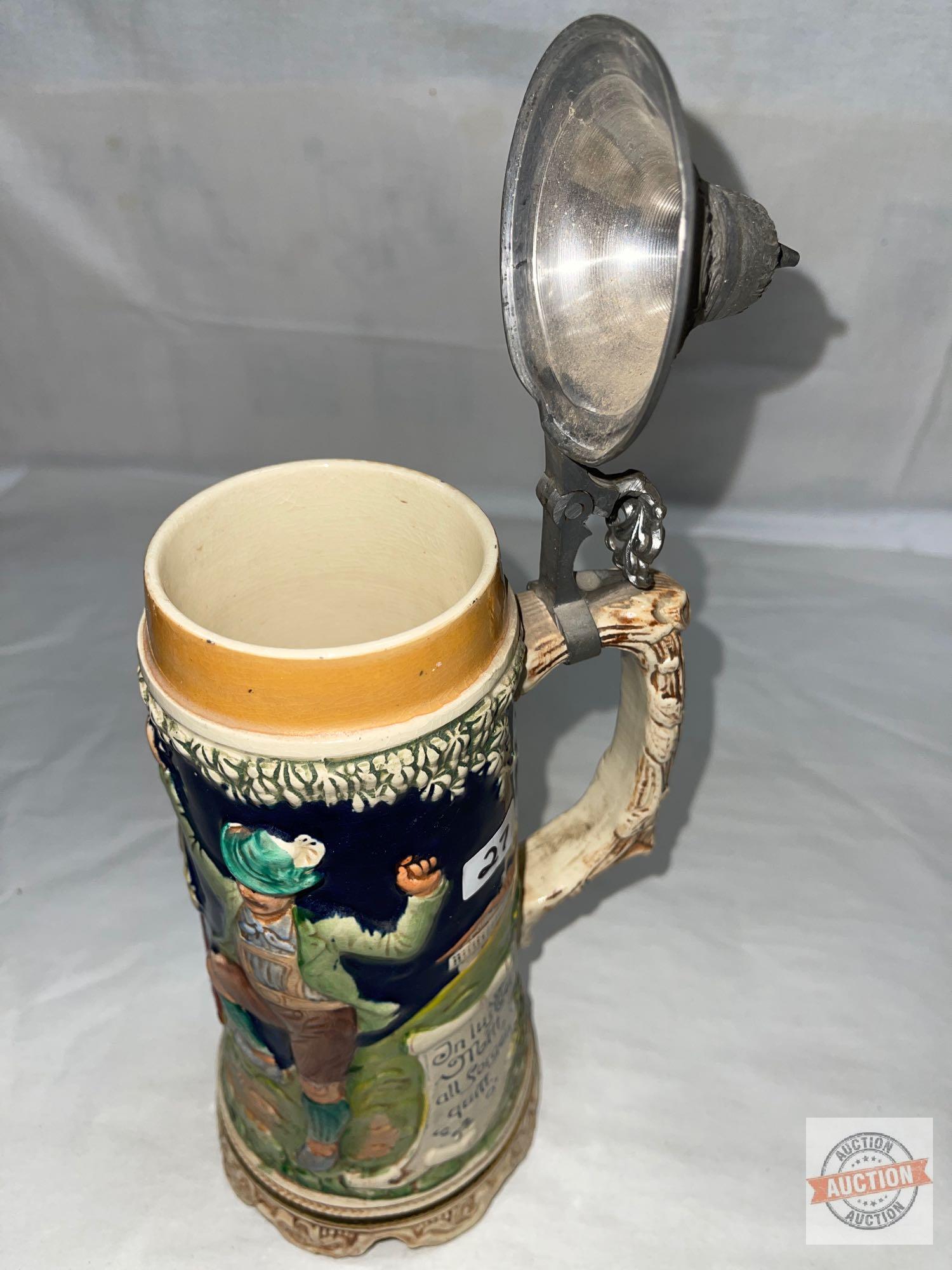 German musical stein with lid, 11"h, embossed motif, does not work