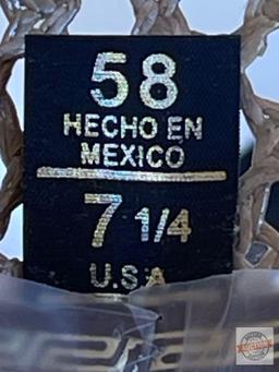 Western straw hat, rope, boot jack and lasso