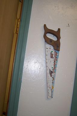 PAINTED HAND SAW (2) AND HORSESHOE