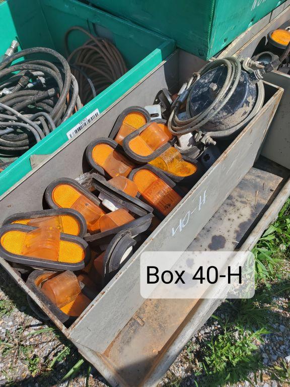 FILING CABINET DRAWER OF ORANGE OVAL LIGHTS