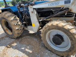 LONG 2610 TRACTOR W/ LONG FRONT END LOADER AND 6' BUCKET, 4WD, 2365 HOURS SHOWING, RUNS/DRIVES,