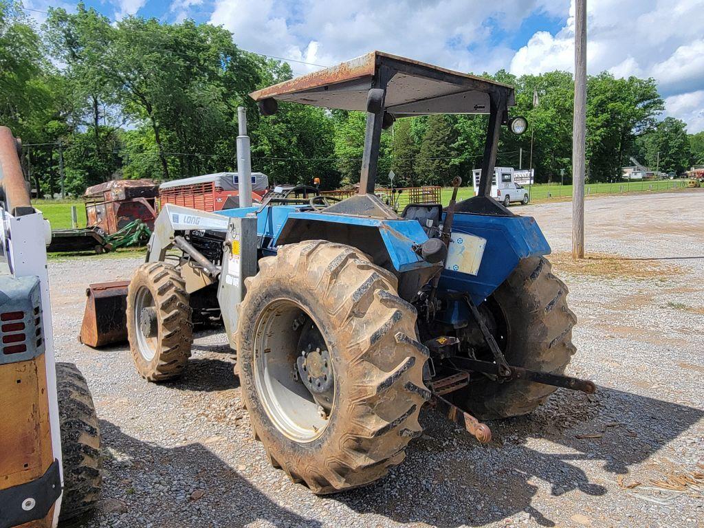 LONG 2610 TRACTOR W/ LONG FRONT END LOADER AND 6' BUCKET, 4WD, 2365 HOURS SHOWING, RUNS/DRIVES,