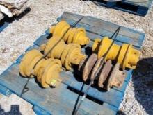 PALLET OF IDLERS FOR TRACK MACHINE