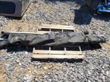 TARP WITH ARMS FOR DUMP TRUCK