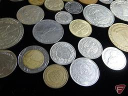 (8) 1 Dollar casino tokens, some Las Vegas some MN, (1) Vintage Chip from MGM Grand