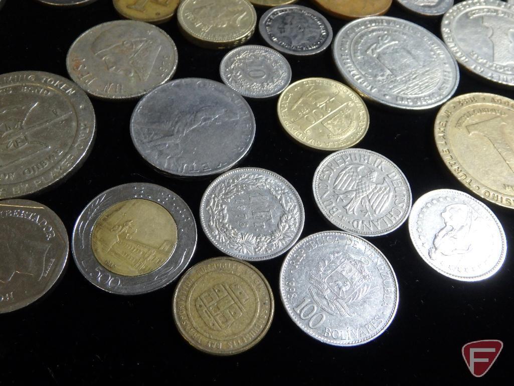 (8) 1 Dollar casino tokens, some Las Vegas some MN, (1) Vintage Chip from MGM Grand