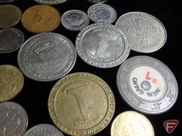 (8) 1 Dollar casino tokens, some Las Vegas some MN, (1) Vintage Chip from MGM Grand