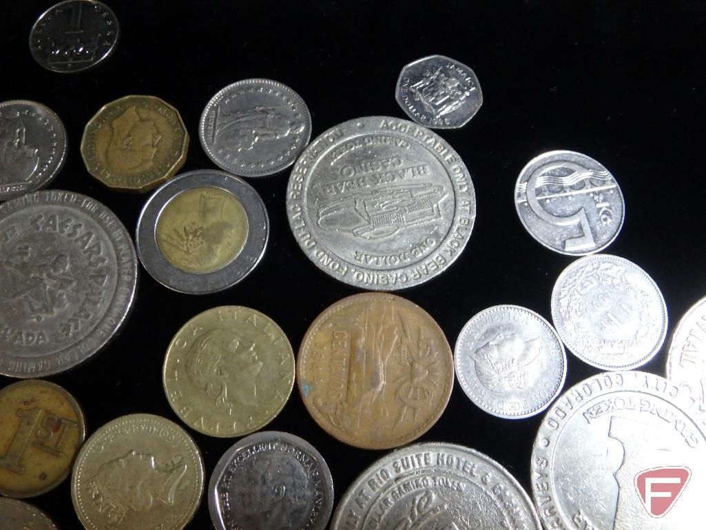 (8) 1 Dollar casino tokens, some Las Vegas some MN, (1) Vintage Chip from MGM Grand