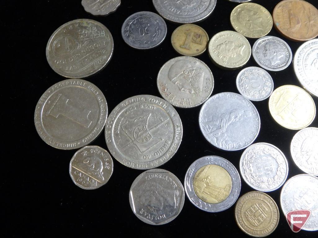 (8) 1 Dollar casino tokens, some Las Vegas some MN, (1) Vintage Chip from MGM Grand