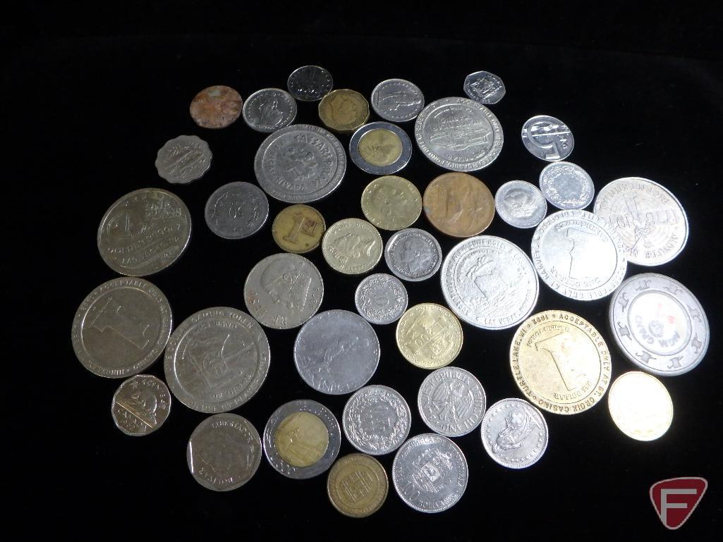 (8) 1 Dollar casino tokens, some Las Vegas some MN, (1) Vintage Chip from MGM Grand
