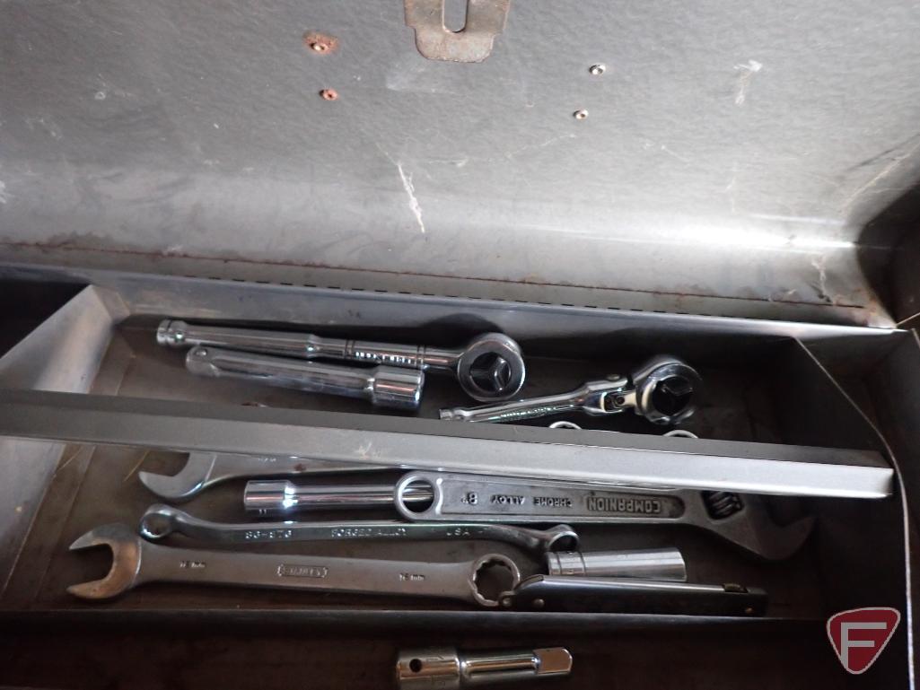 Hand tools: saws, level, sockets, wrenches, rivet tool, trouble light, hammer.