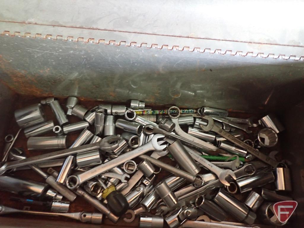 Hand tools: saws, level, sockets, wrenches, rivet tool, trouble light, hammer.