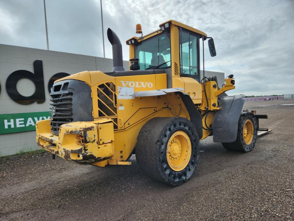 2010 Volvo L90F Wheeled Loader c/w Cab, 60" Forks, QC (Brakes Need Attentio
