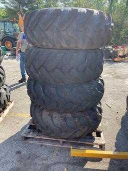 (4) Tires 16.9X24 and rims, Pnuematic, fits  JCB 4CX RTB, See pic on spike