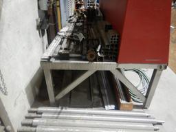 CONTENTS ON & UNDER TABLE :  ROLLERS, NON-WORKING TOOLS, EXPANDED METAL, BO