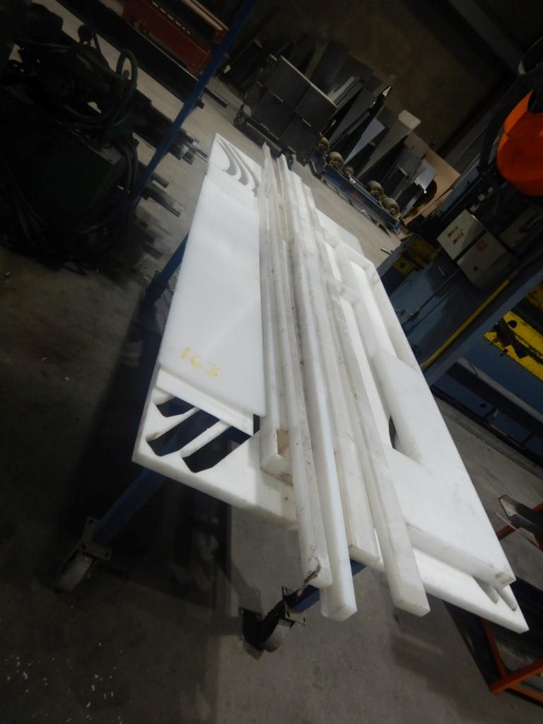 ROLL AROUND TABLE AND LOT OF UHMW PIECES