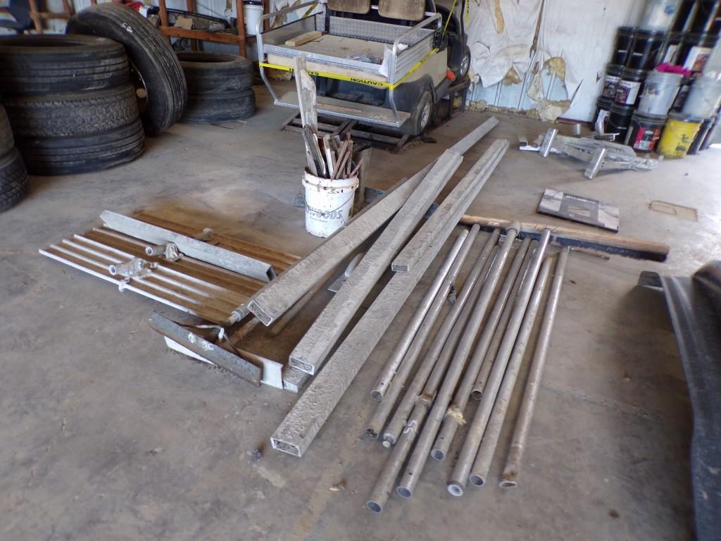LARGE LOT WITH CONCRETE FINISHING TOOLS,  BULL FLOATS, BROOMS, HAND TOOLS,