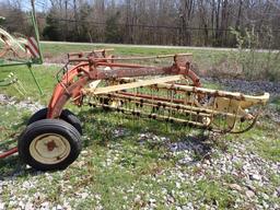 NEW HOLLAND 256 ROLLABAR HAY RAKE,