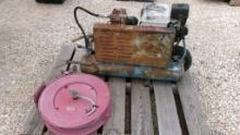 PORTABLE AIR COMPRESSOR,  GAS, HOSE REEL, AS IS WHERE IS