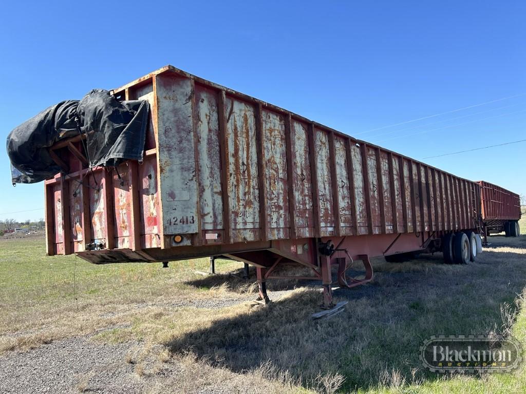 FLAT DECK TRASH TRAILER,  SLIDING TANDEM AXLE, 11R22.5 TIRES ON STEEL BUDDS